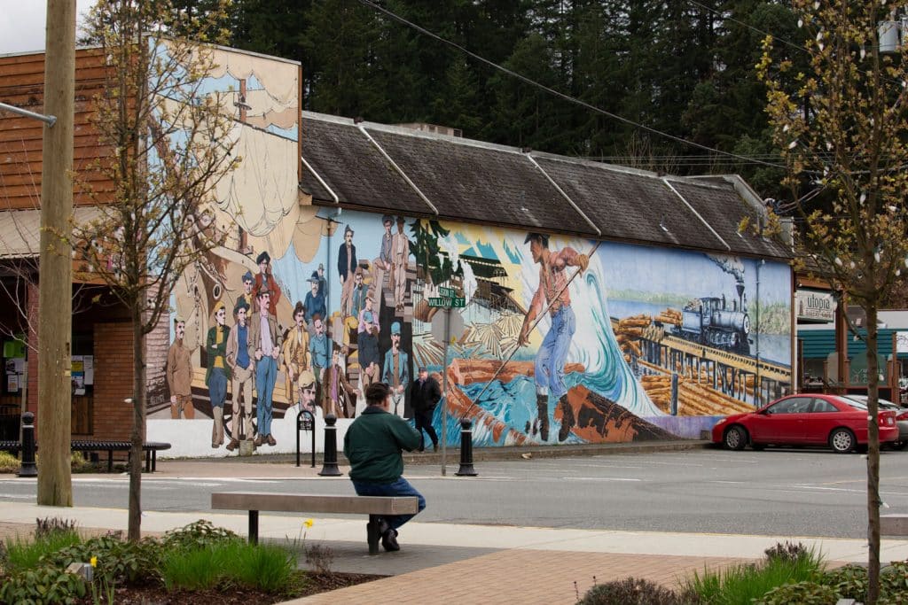 Colorful mural depicting historical scenes.