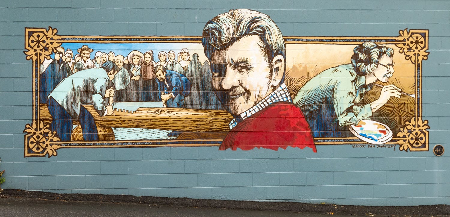 Mural depicting community service and collaboration.