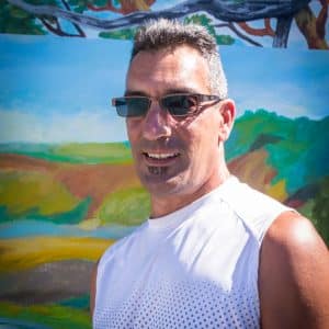 Man in white shirt outdoors