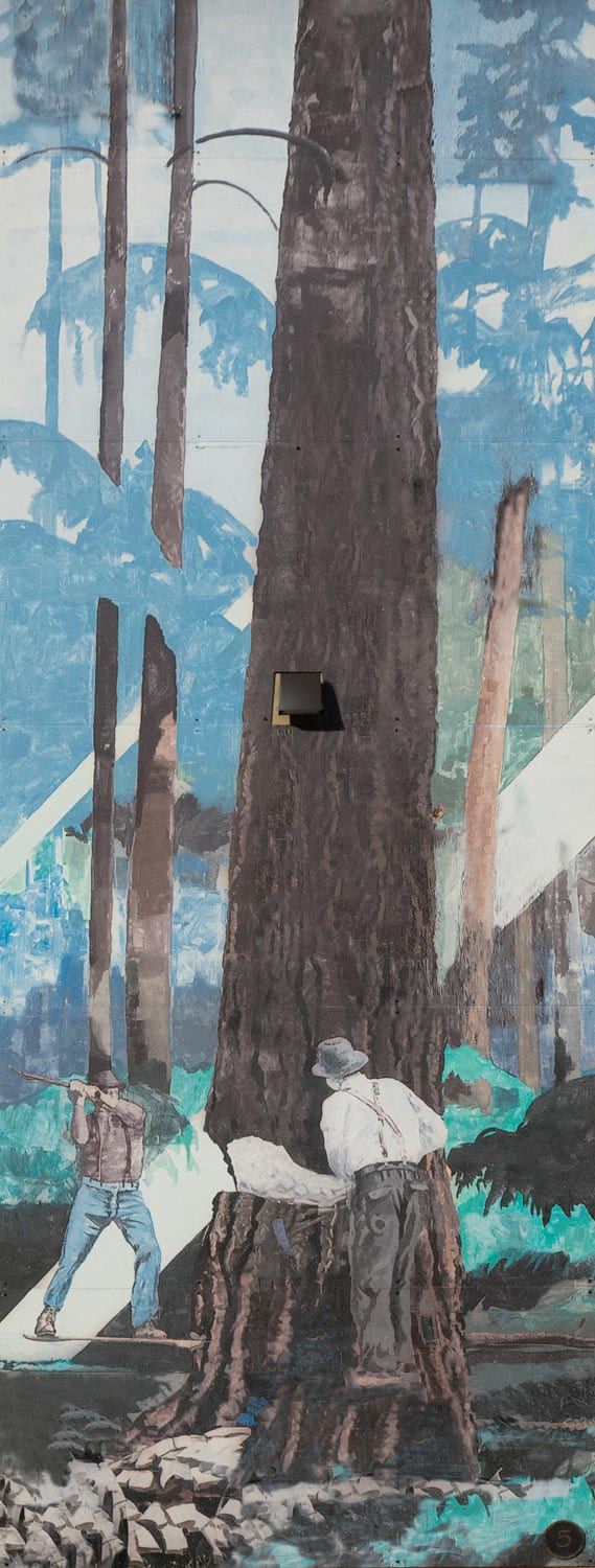 Men cutting down a large tree