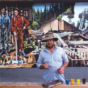 Man painting in front of mural.